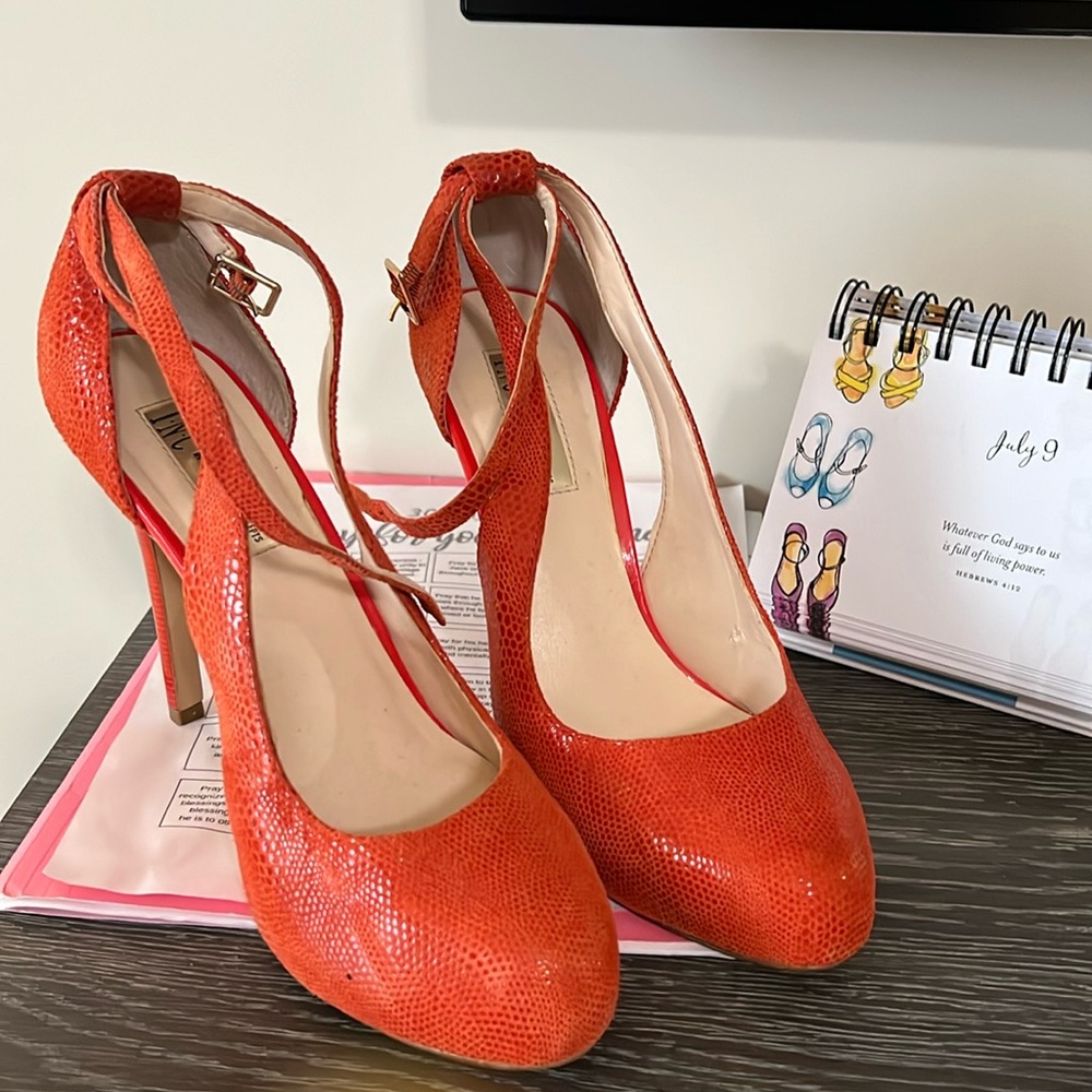 Orange show stoppers ankle strap heels
